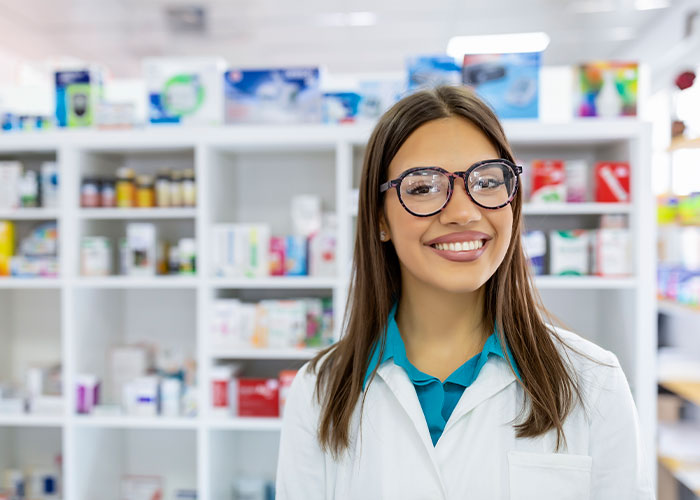Image of woman talking to pharmacist in pharmacy